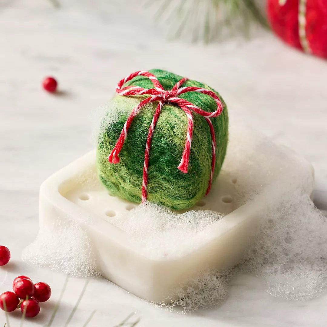 Green gift-shaped felted soap