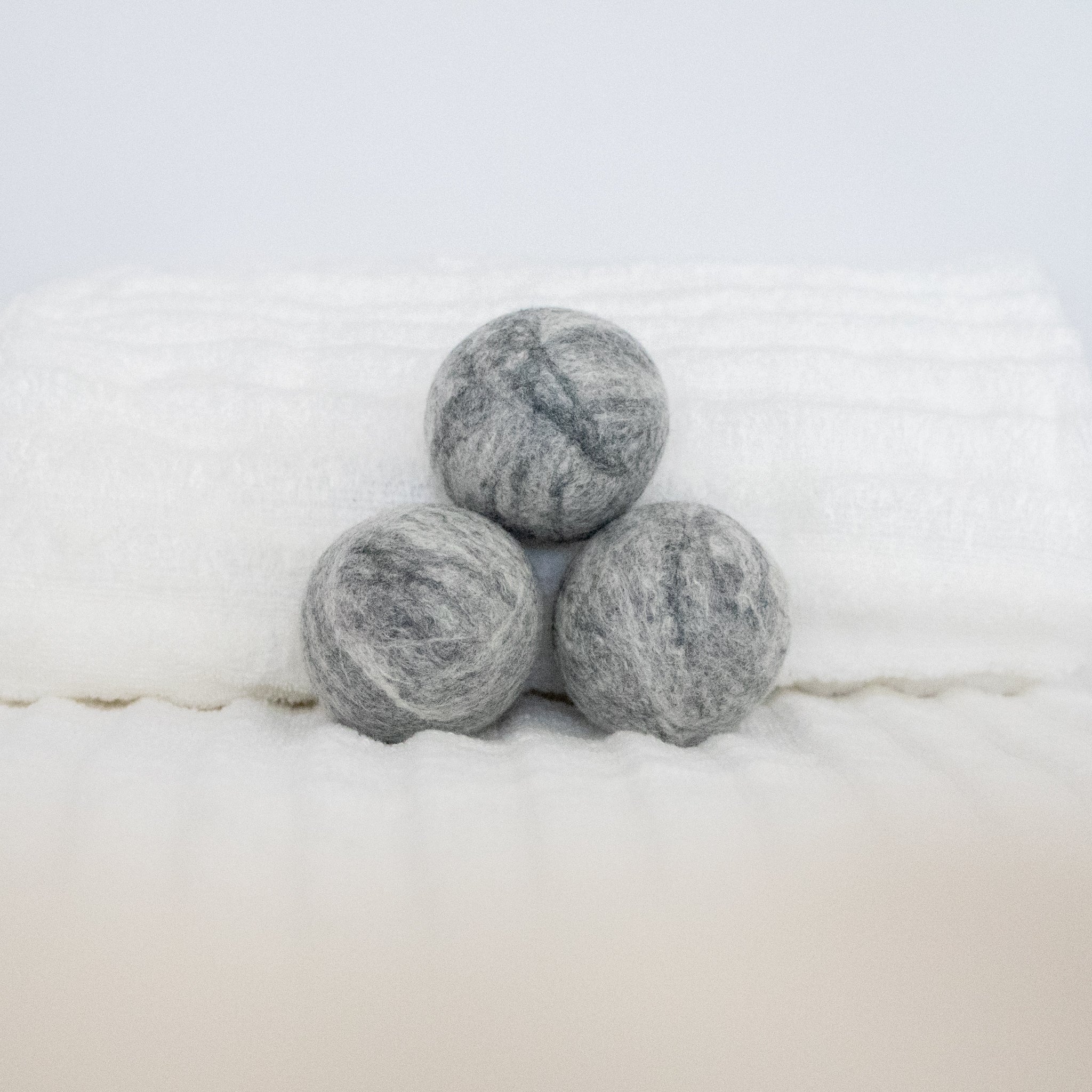 Heather gray wool dryer balls